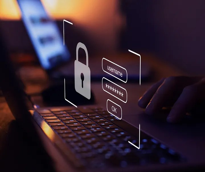 Digital login graphic above keyboard with user typing